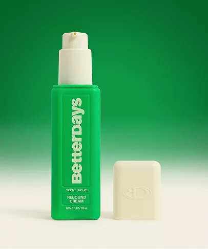 BetterDays Resound Cream in a bright green rectangular pump bottle with a white cap, shown next to its off-white outer box on a green gradient background.